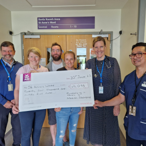 Pictured L-R: John Hickey, CEO of St. Vincent's Foundation; Laoise Traynor, Damy & Lisa Redmond; Dr. Claire Andrews, Consultant Haematologist at St. Vincent's University Hospital; and Leo Ortiz, CMN2 St Anne's Ward, at today's heartfelt cheque presentation in memory of Marian Redmond. Their collective efforts will make a meaningful difference in the lives of families affected by cancer.